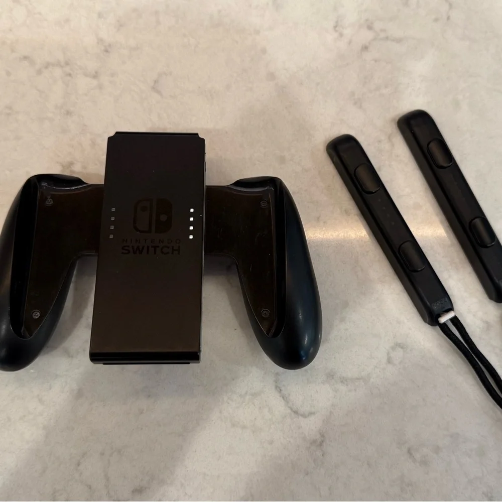 Nintendo Switch Console w/ Game, Case, Dock, and Joy-Cons.